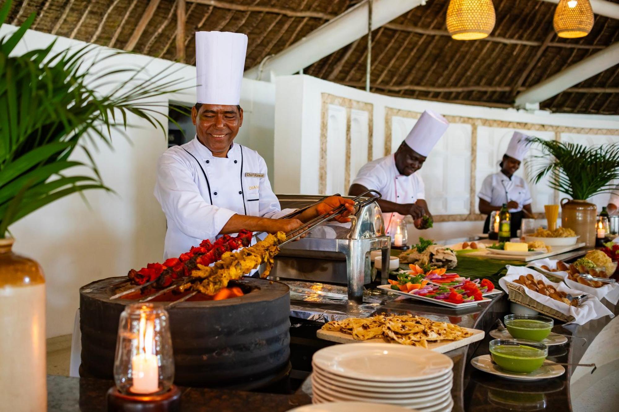 Diamonds Leisure Beach & Golf Resort Диани Бийч Екстериор снимка A buffet at a resort